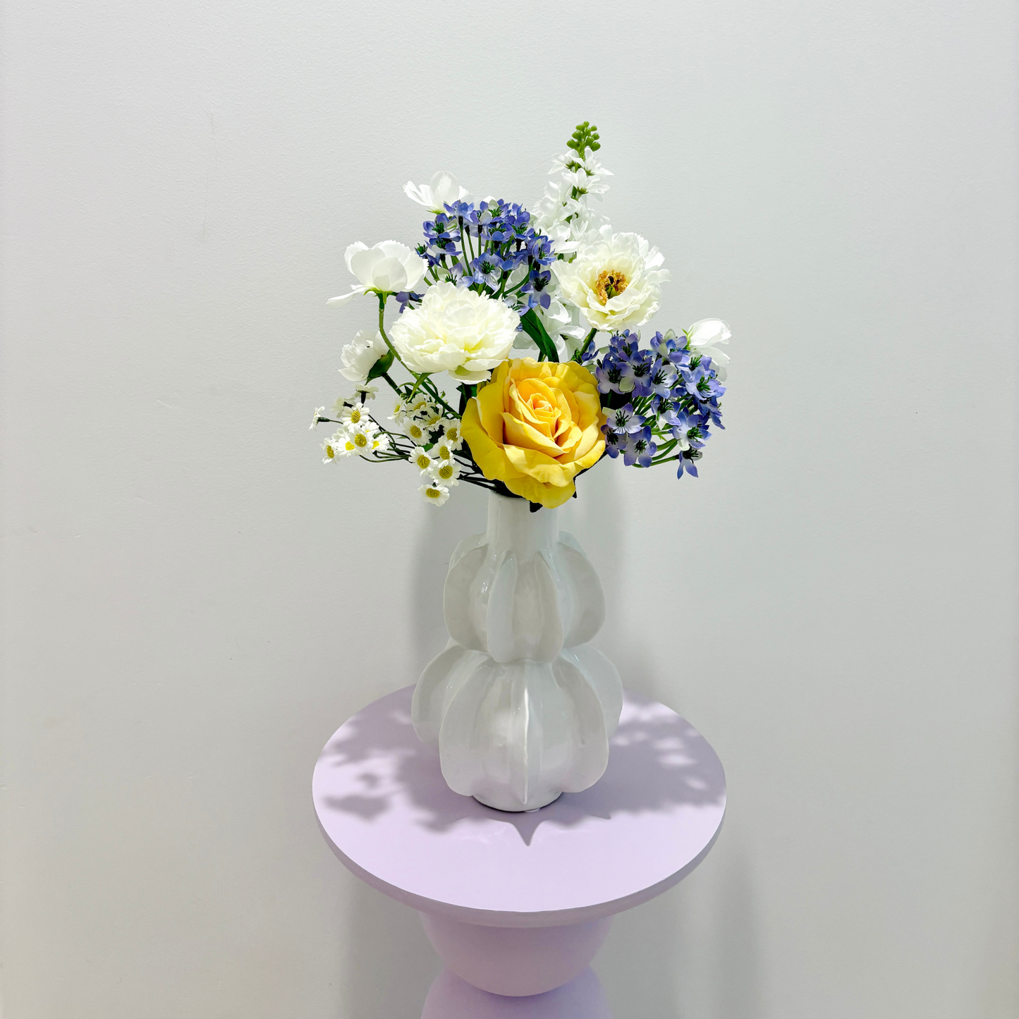 Sunny Meadow Melody Mixed Floral Arrangement in Sculptural White Vase