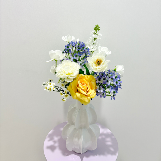 Sunny Meadow Melody Mixed Floral Arrangement in Sculptural White Vase